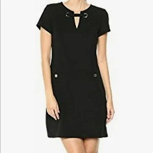 Tommy Hilfiger size 10 black dress with gold accents.